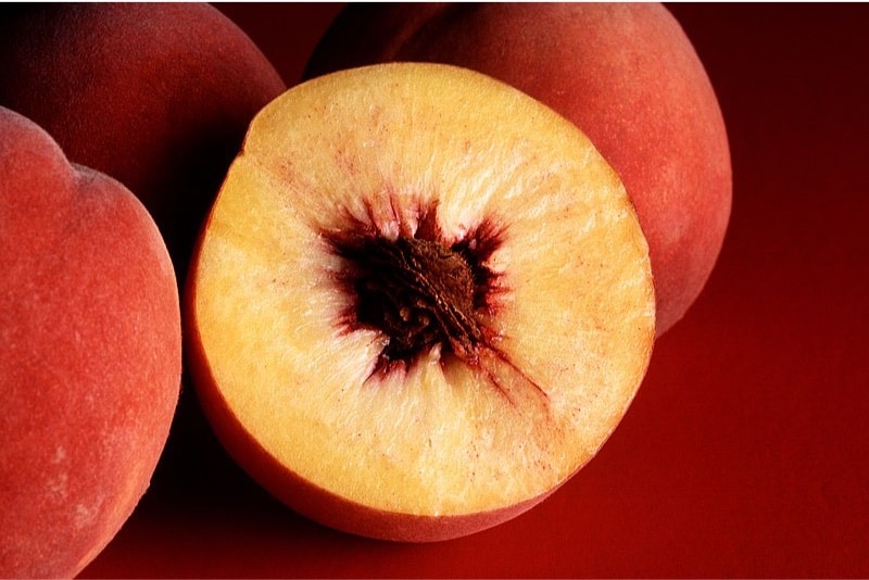 Why do I need to be cautious while having peaches during pregnancy