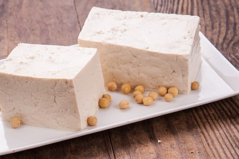 What are the positive or negative effects of having tofu during